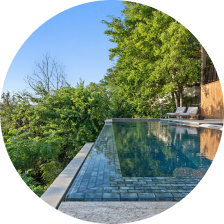 Renovated pool with modern water features and new tiles in Westlake